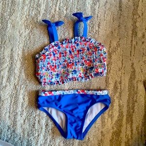 Super cute floral 2 piece swim set. Size 2T. Worn once!